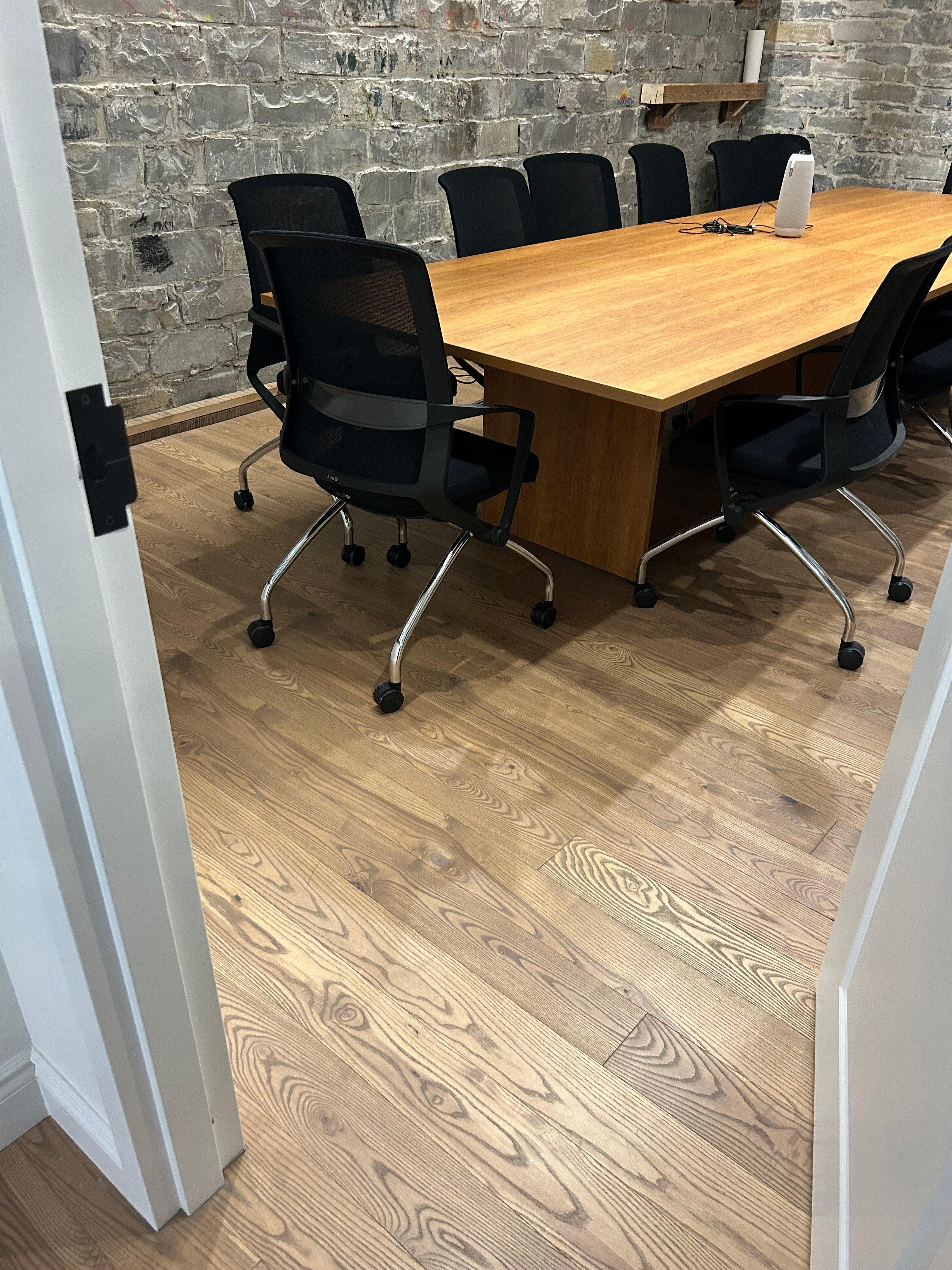 Mid Tone Ash Hardwood Flooring in an Office setting