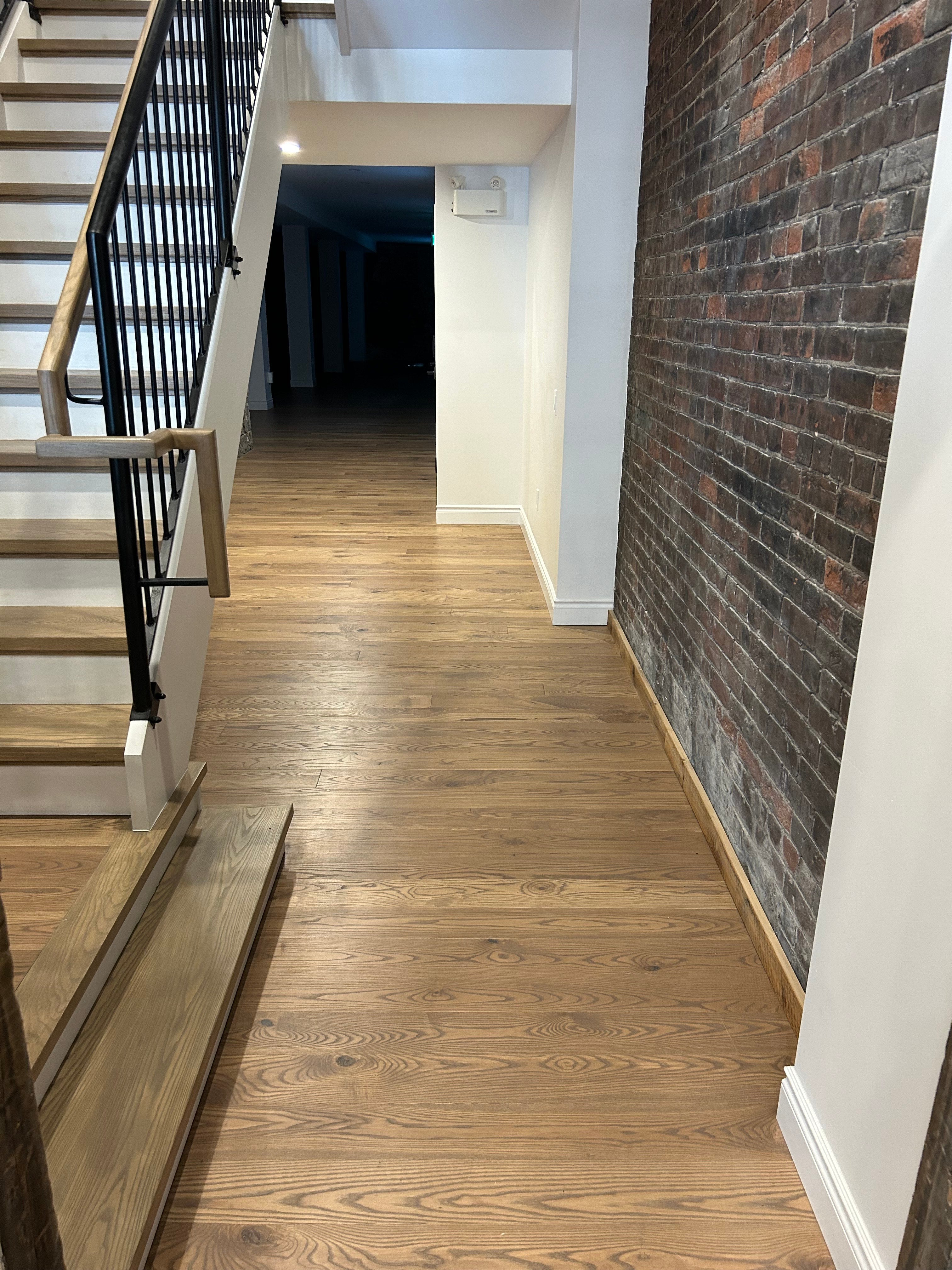 Mid Tone Ash Hardwood Flooring in an Office setting