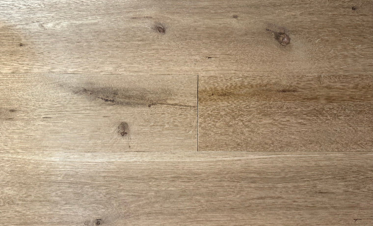 Close-up of a wooden floor with a natural finish